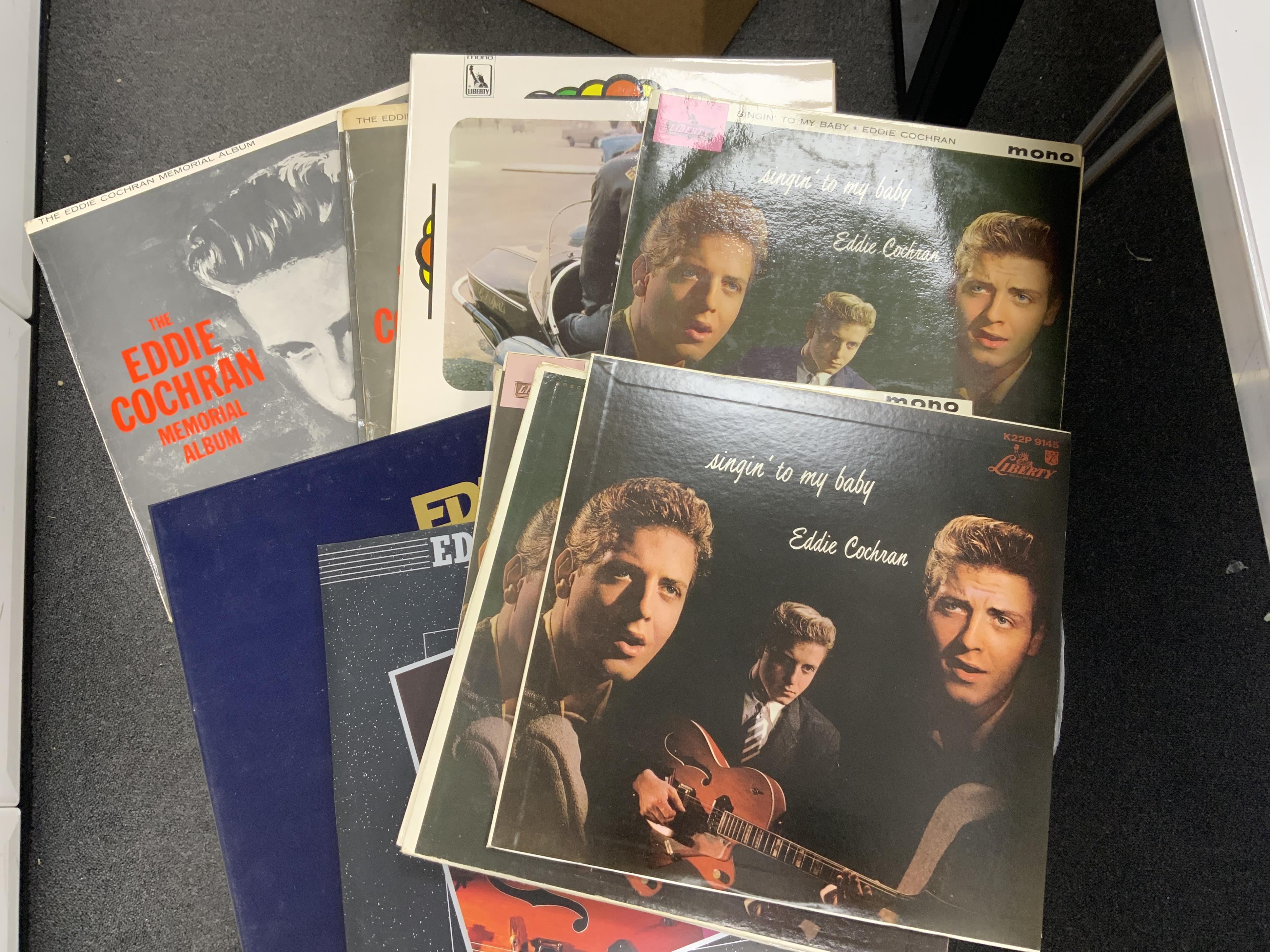 Ninety-six Eddie Cochran LP record albums, including some later pressings of early albums on Liberty labels etc.; 20th anniversary box set, 15th anniversary album, On the Air, My Way, Cherished Memories, the Eddie Cochra